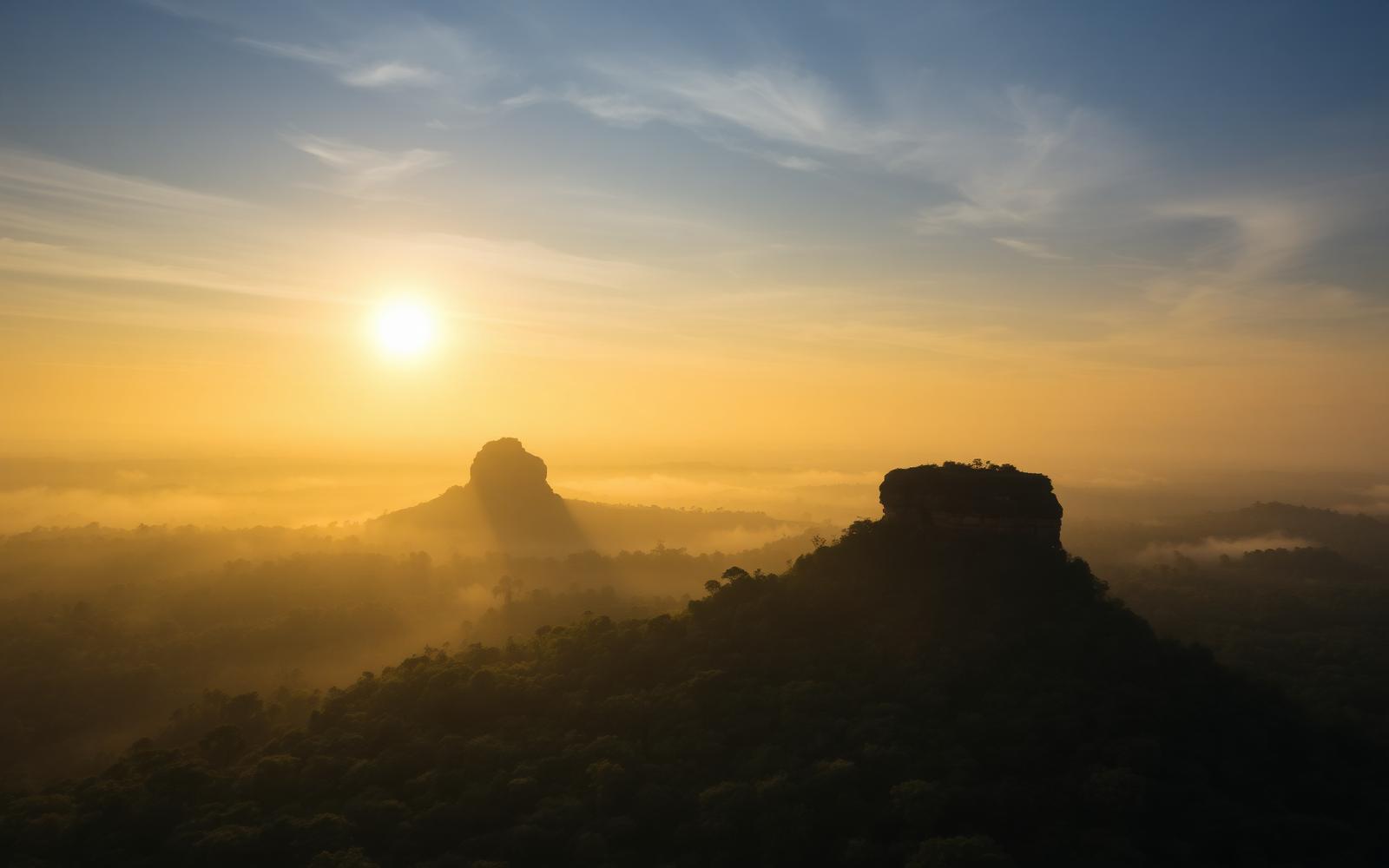 Sunrise seen from Pidurangala Rock, with Sigiriya in the mist